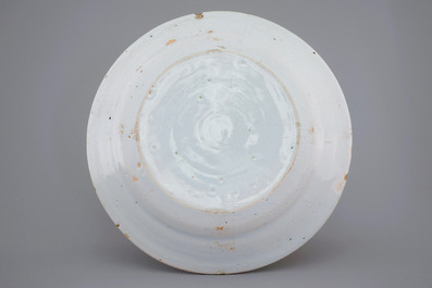 A Brussels faience plate with Cupid with bow and arrows, ca. 1780