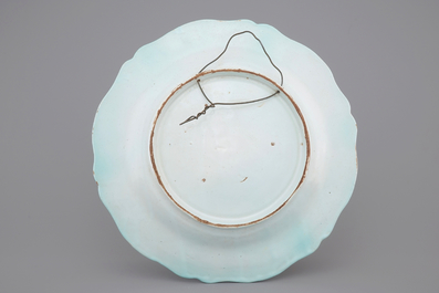 A Brussels faience dish with butterflies and caterpillars, 19th C.