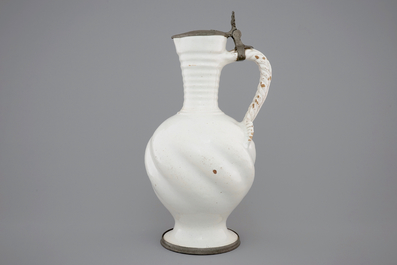 A large white Delft pewter-mounted jug with rope twist handle, 17th C.