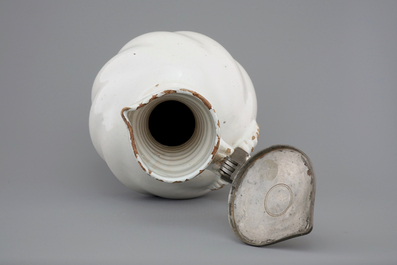 A large white Delft pewter-mounted jug with rope twist handle, 17th C.