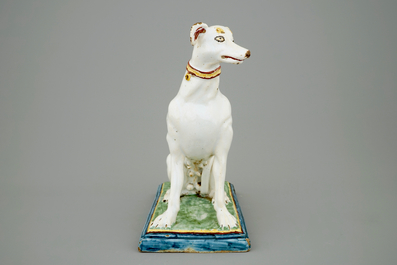 A tall polychrome Brussels faience model of a sighthound, 18th C.