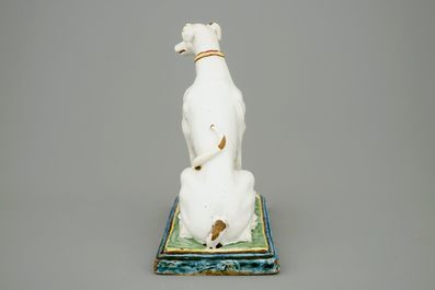 A tall polychrome Brussels faience model of a sighthound, 18th C.