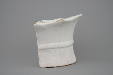A white Delft pottery wall flower holder, 18th C.