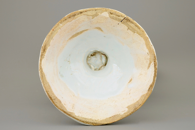 A large French faience blue and white relief-decorated jug, 18th C.