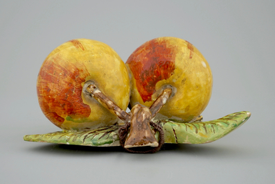 A pair of hanging apples in Dutch Delftware, 18th C.