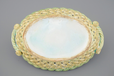 A Brussels faience basket with butterflies and caterpillars, 18th C.