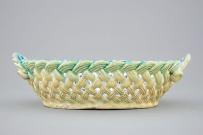 A Brussels faience basket with butterflies and caterpillars, 18th C.