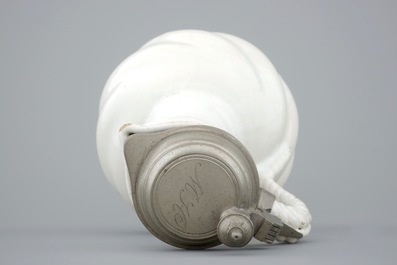 A large white Delft pewter-mounted jug with rope twist handle, 17th C.