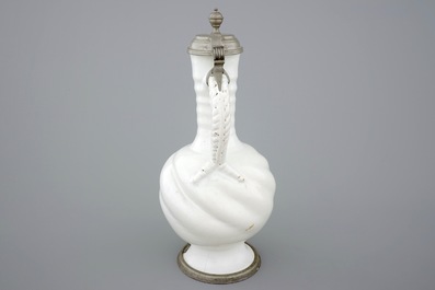 A large white Delft pewter-mounted jug with rope twist handle, 17th C.