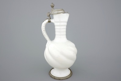 A large white Delft pewter-mounted jug with rope twist handle, 17th C.