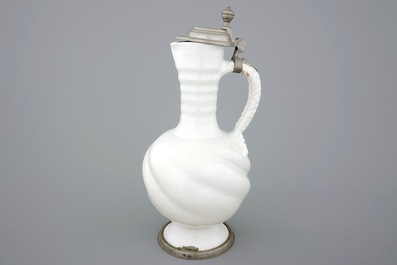 A large white Delft pewter-mounted jug with rope twist handle, 17th C.