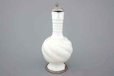 A large white Delft pewter-mounted jug with rope twist handle, 17th C.