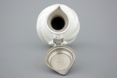 A large white Delft pewter-mounted jug with rope twist handle, 17th C.