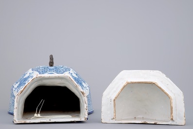 A massive blue and white Dutch Delft cistern with pewter spout, 18th C.