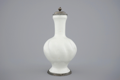 A white Dutch Delft pewter-mounted gadrooned jug, 18th C.