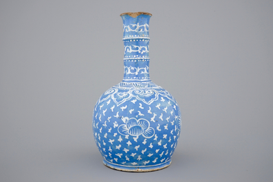 A bottle-shaped Persian style blue ground vase, poss. France, 18/19th C.