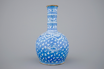 A bottle-shaped Persian style blue ground vase, poss. France, 18/19th C.