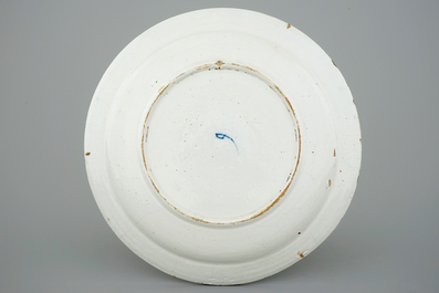 A blue and white Dutch Delft chinoiserie dish, 18th C.