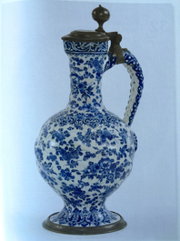 A large white Delft pewter-mounted jug with rope twist handle, 17th C.