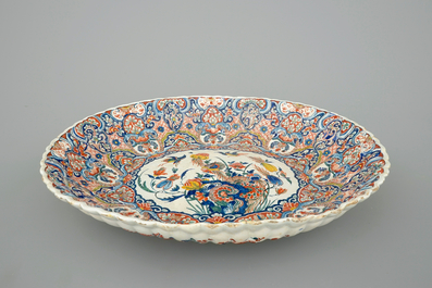 A fluted oval Dutch Delft dish in cashmere palette, ca. 1700