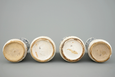 A set of four tall Spanish blue and white albarelli, 18th C.