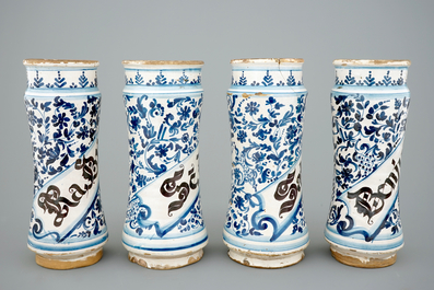 A set of four tall Spanish blue and white albarelli, 18th C.