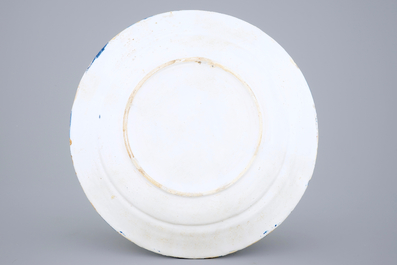 A blue and white dish with double eagles, Delft or Haarlem, 17th C.