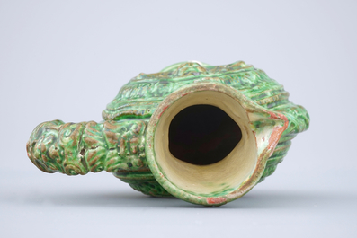 A green glazed Saintonge relief decorated jug, France, 17th C.
