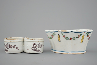 A Dutch Delft strainer, a wall flower holder and a cruet stand in French faience, 18th C.