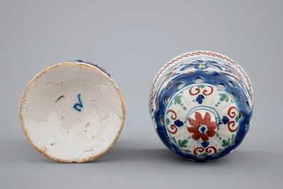 A polychrome Dutch Delft caster with lightning decoration, late 17th C.