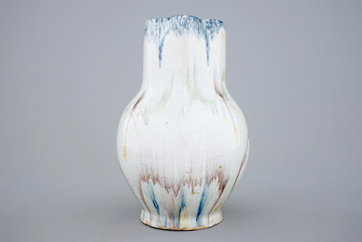 A French faience faux-marbre jug, Rouen, Poterat workshop, 18th C.