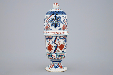 A polychrome Dutch Delft caster with lightning decoration, late 17th C.