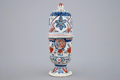A polychrome Dutch Delft caster with lightning decoration, late 17th C.