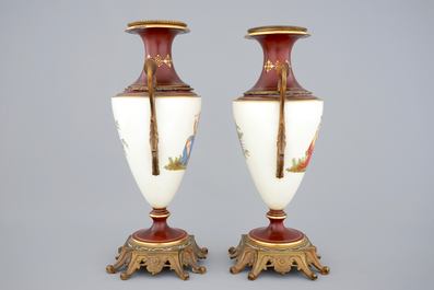 A pair of S&egrave;vres style vases with bronze mounts, Brussels, 19th C.
