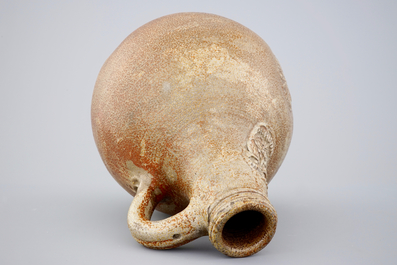 A large brown-glazed stoneware bellarmine jug, 17/18th C.