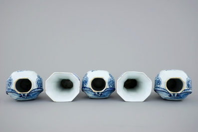 A 5-piece blue and white Dutch Delft garniture with landscape design, 18th C.