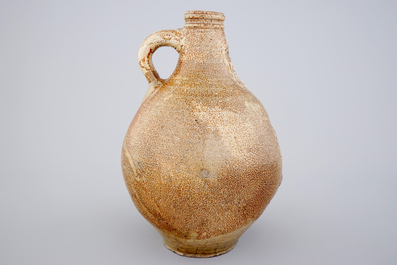 A large brown-glazed stoneware bellarmine jug, 17/18th C.