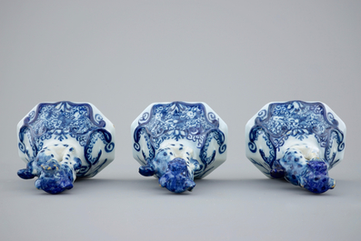 A 5-piece blue and white Dutch Delft garniture with landscape design, 18th C.