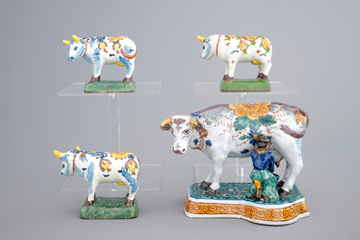 Un lot de 4 vaches en fa&iuml;ence polychrome de Delft, 19&egrave;me