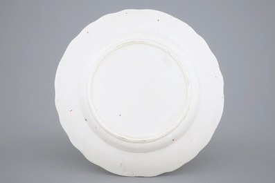 A polychrome Tournai porcelain plate with floral decoration, 18th C.