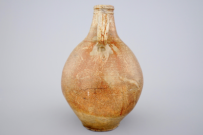 A large brown-glazed stoneware bellarmine jug, 17/18th C.