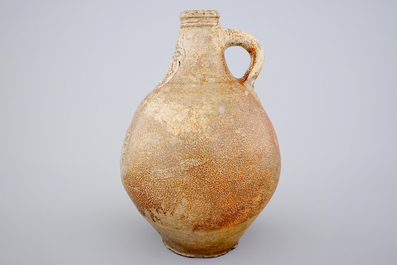 A large brown-glazed stoneware bellarmine jug, 17/18th C.