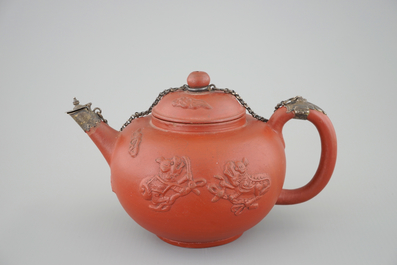 A Dutch Delft Ary de Milde red earthenware teapot and cover, late 17th C.