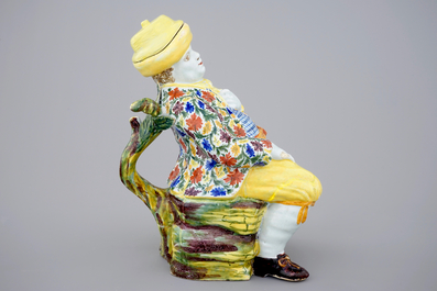 Une fontaine de table en fa&iuml;ence de Delft polychrome en forme d'homme, 18&egrave;me