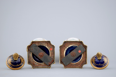 A pair of bronze-mounted signed and marked S&egrave;vres porcelain vases, 19th C.