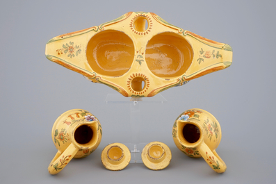 3 Dutch Delft plates and a French faience oil and vinegar set, 18/19th C.
