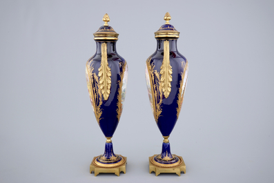 A pair of bronze-mounted signed and marked S&egrave;vres porcelain vases, 19th C.