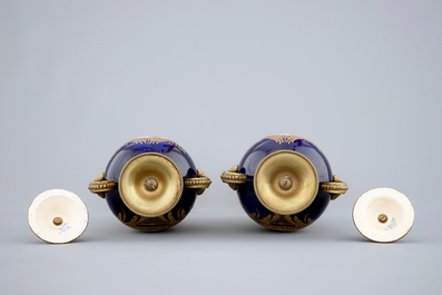 A pair of bronze-mounted signed and marked S&egrave;vres porcelain vases, 19th C.