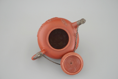 A Dutch Delft Ary de Milde red earthenware teapot and cover, late 17th C.