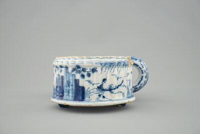A Dutch Delft blue and white cruet set stand, 18th C.